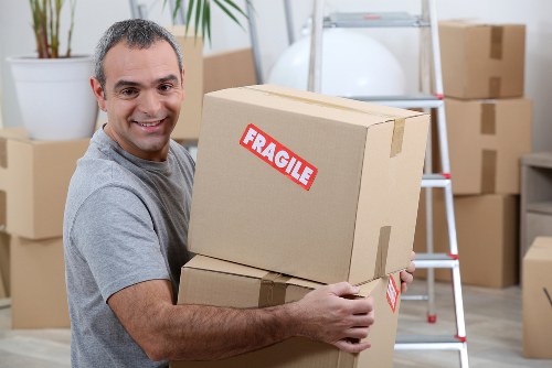 Removal team loading boxes for a home move in Tufnell Park