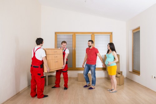 Supervisors reviewing a removals health and safety policy