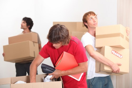 Packed boxes and furniture ready for a local home removal
