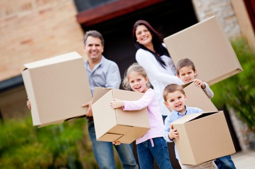 Moving vehicle loading items near a North London property