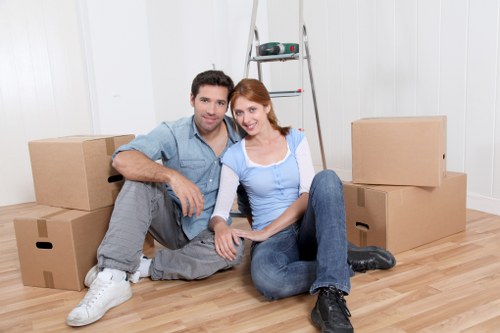 Careful packing materials used for fragile belongings during relocation