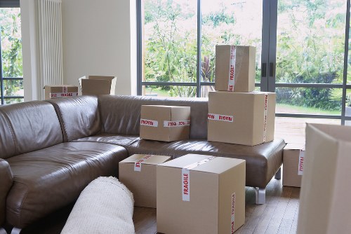 Trained movers using protective equipment during a removal job